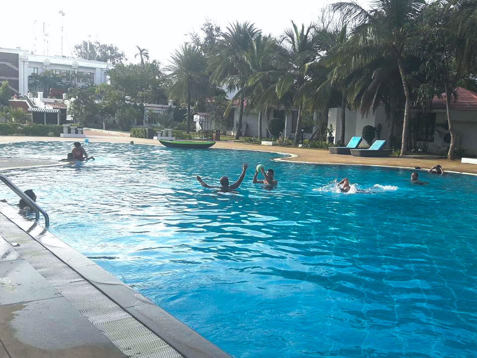 Bloggers Playing pool volleyball at Chariot Beach Resort Mahabalipuram